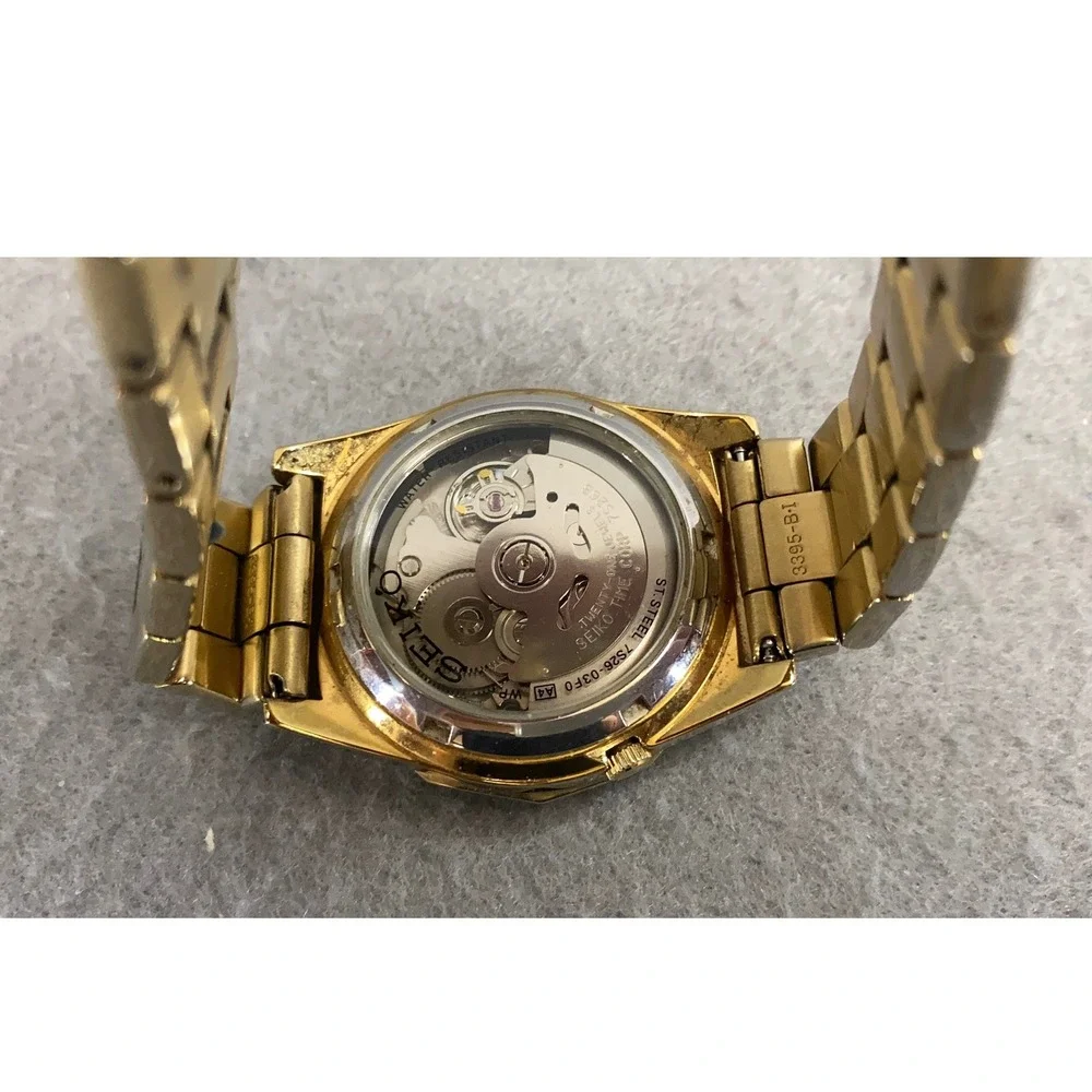 Seiko 5 Automatic 21 Jewels Gold Dial Mens Watch 7S26-03F0‎ Exhibition Back